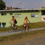 Playing beach volleyball and riding a bike
