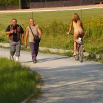 Playing beach volleyball and riding a bike