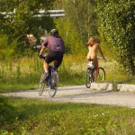 Playing beach volleyball and riding a bike