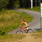 Playing beach volleyball and riding a bike