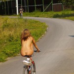 Playing beach volleyball and riding a bike