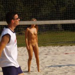 Playing beach volleyball and riding a bike