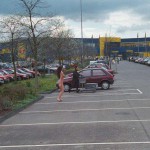 At the parking lot of a shopping