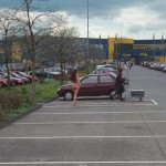 At the parking lot of a shopping