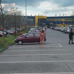 At the parking lot of a shopping