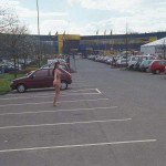 At the parking lot of a shopping