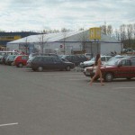 At the parking lot of a shopping