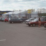 At the parking lot of a shopping