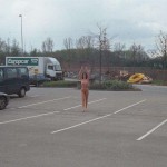 At the parking lot of a shopping