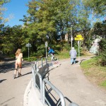 In a park and rollerblading
