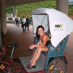 In a bicycle riksha in the city center