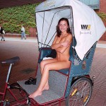 In a bicycle riksha in the city center