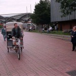 In a bicycle riksha in the city center