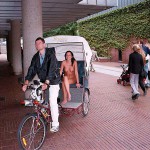 In a bicycle riksha in the city center
