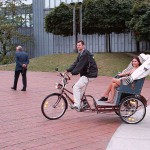 In a bicycle riksha in the city center