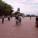 In a bicycle riksha in the city center