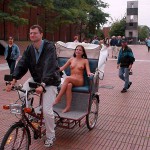 In a bicycle riksha in the city center