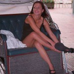 In a bicycle riksha in the city center