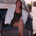 In a bicycle riksha in the city center