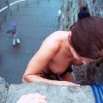 At the wall of a downtown bridge