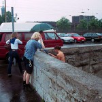 At the wall of a downtown bridge