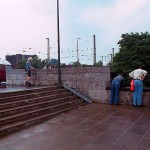 At the wall of a downtown bridge