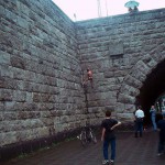 At the wall of a downtown bridge