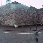 At the wall of a downtown bridge