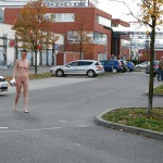 On a parking lot and in the center