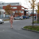 On a parking lot and in the center