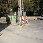 On a parking lot and in the center