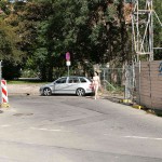 On a parking lot and in the center