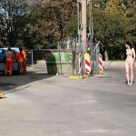 On a parking lot and in the center