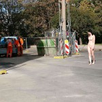 On a parking lot and in the center