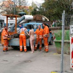 On a parking lot and in the center