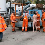 On a parking lot and in the center