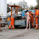 On a parking lot and in the center