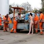 On a parking lot and in the center