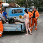 On a parking lot and in the center