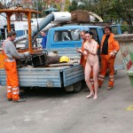 On a parking lot and in the center