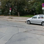 On a parking lot and in the center