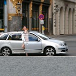 On a parking lot and in the center