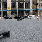 On a parking lot and in the center