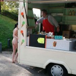 On a parking at a hot dog stand