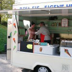 On a parking at a hot dog stand