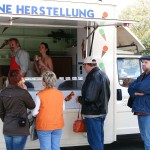 On a parking at a hot dog stand