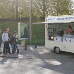 On a parking at a hot dog stand