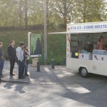 On a parking at a hot dog stand