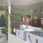 On a parking at a hot dog stand