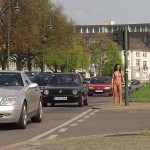 At a crossing in front of a palace